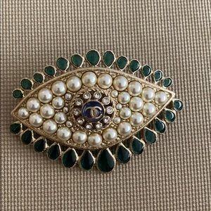 Chanel gold brooch